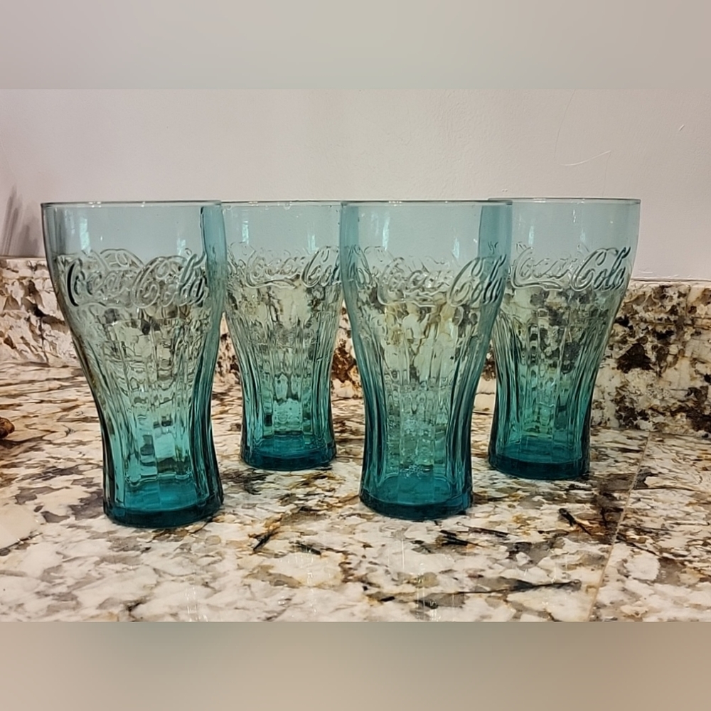 Set of 4 green glass Coca-cola Glasses 12 oz. Good condition.